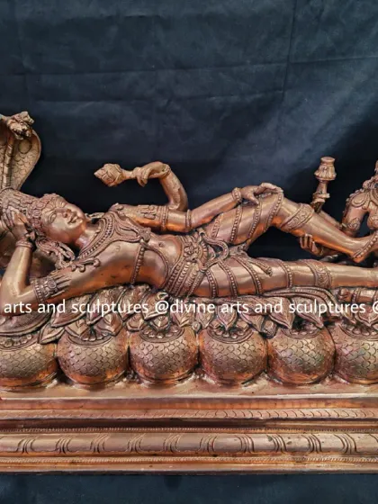 A different angle of the Ananthasayanam Vishnu, showing the intricate details of the serpent's coils and the base of cosmic waters represented by pots.