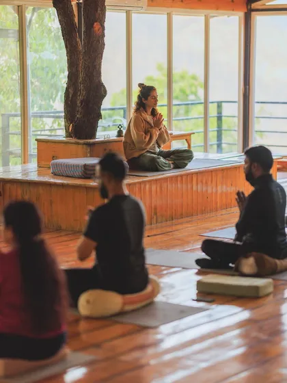 Leading a morning meditation and mantra chanting session. Setting our intention together as a group is a powerful way to begin the day.