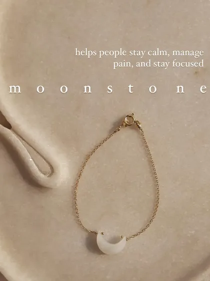 My white moonstone Luna bracelet, a piece designed to help you stay calm, manage pain, and remain focused. It’s a simple charm with a powerful, soothing energy.