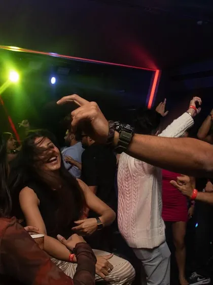 Guests dancing and celebrating at our Paparazzi New Year's Eve event. I create themed NYE parties that offer a unique and glamorous way to ring in the new year.