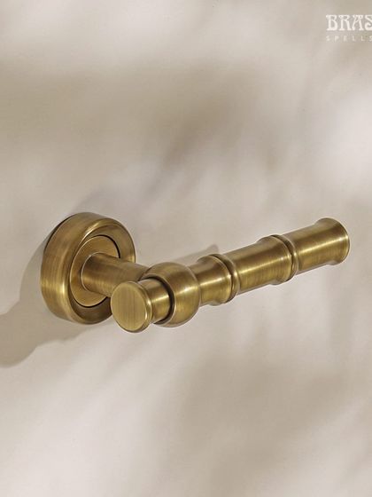 The Bamboo lever handle on a rose. This piece allows the bamboo motif to be carried through to all interior doors, creating a cohesive and nature-inspired design story throughout a home.