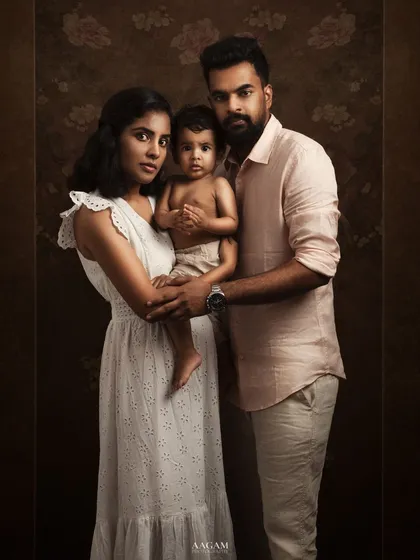 Yesterday's memories, tomorrow's treasures. This beautiful family portrait, with its soft, coordinated color palette, is a perfect example of a modern heirloom.