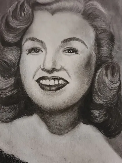 This is a finished charcoal portrait of the classic Hollywood icon, Marilyn Monroe. We often study famous faces in my workshops to master capturing recognizable features and glamorous expressions.