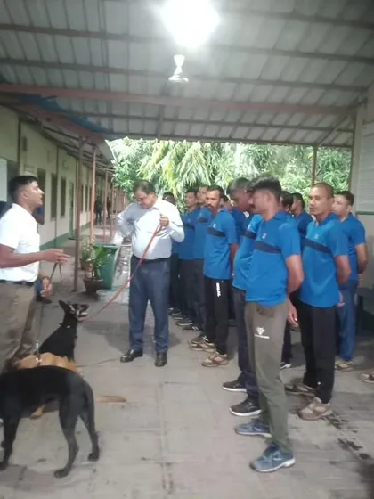 It's a privilege to share what I've learned with others. Here, I'm conducting an interactive session with a group of handlers, likely from a police or security unit.