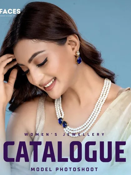A model showcases a three-strand pearl necklace with blue accents. The soft, elegant feel of this photo is ideal for promoting classic and sophisticated jewellery collections.