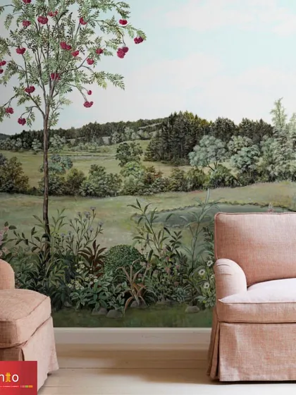 The 'Rowan' panoramic wallpaper by Nobilis, which transforms this living space into an exquisite garden setting. The pastoral landscape brings a sense of grace, sophistication, and timeless charm to the walls.