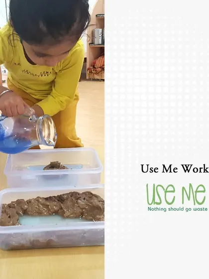 This image shows a child participating in an upcycling activity with our partner, Use Me Work. They are learning about sustainability by creating something new from discarded materials.
