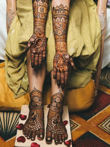 A complete bridal look from hands to feet. The hands feature detailed portraits, while the feet are adorned with complementary traditional patterns.