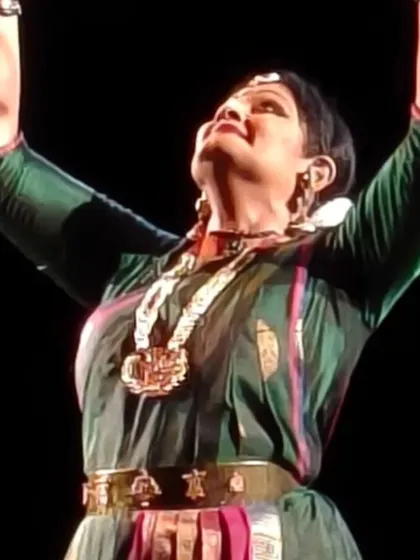 The arms extended in a gesture of expanse and grace. This photograph from my Kolkata performance highlights the beautiful lines and sculptural quality of Bharatanatyam.