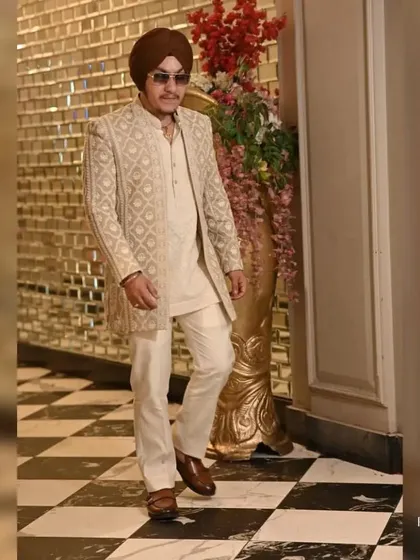 Our client, Gkirat, exudes confidence and style in a bestselling Indo-Western outfit. The intricate embroidery and modern silhouette make it a perfect choice for any celebration.