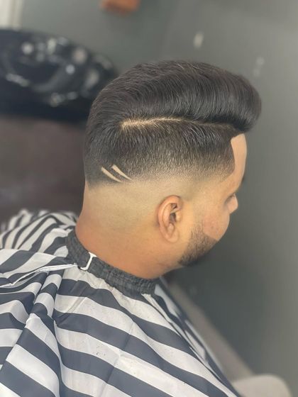 A slightly different angle of the double-line design, showing how it enhances the shape of the haircut.