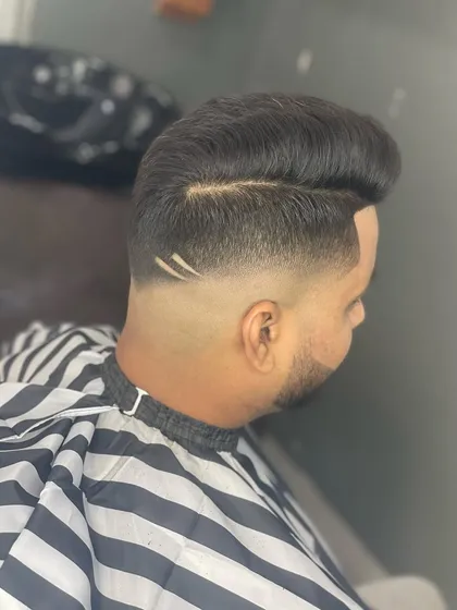 A slightly different angle of the double-line design, showing how it enhances the shape of the haircut.
