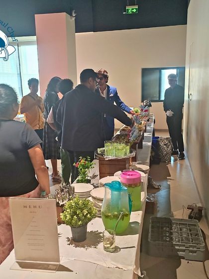 Another view of the catering setup for the Netflix shoot, showing the menu and fresh welcome drinks ready for the cast and crew.