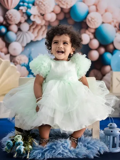 Look at that laugh. Our goal with toddlers is to let them play and be themselves, allowing us to capture their true, unfiltered personality in a relaxed studio setting.
