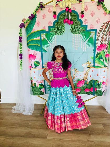 Posing like a star. This Banarasi Pattu lehenga with its bright colors and traditional patterns is one of my most popular designs.