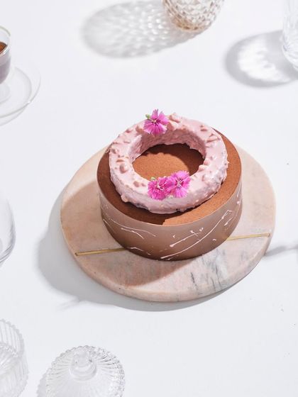 Another angle of the Belgian Chocolate and Raspberry Entremet, capturing its elegance from above.