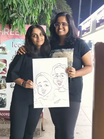 These two friends were so happy with their caricature. It's a great gift for best friends too.