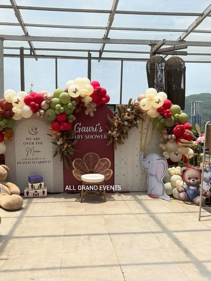 Another full view of the rooftop baby shower decor, showcasing the symmetrical arrangement and the beautiful natural light.