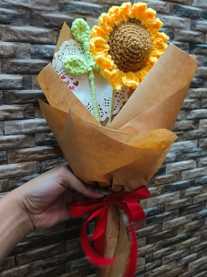 A single crochet sunflower, beautifully wrapped and ready to go. This is a simple, affordable, and super sweet gift for any occasion.