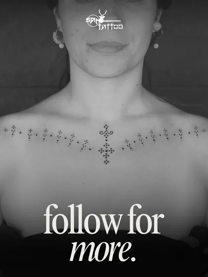 The final artwork. A delicate and symmetrical Rajasthani "Trajva" folk pattern tattooed across the collarbone, a beautiful piece of cultural art.