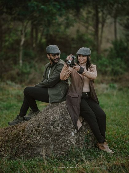 Ananthu and Sarga playfully posing during their vintage-themed shoot. I encourage couples to have fun and let their personalities shine through.