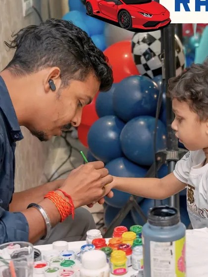 Adding a creative touch with face painting. This is a great activity to keep the little guests entertained and let them become part of the party's theme.