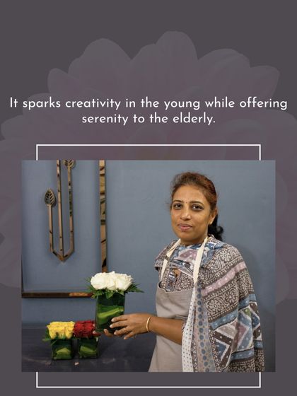 A student displays her simple yet elegant creations in small vases. This shows that even small arrangements can have a big impact.