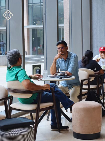 Deep in conversation over coffee. I love seeing our space used for connection and collaboration.