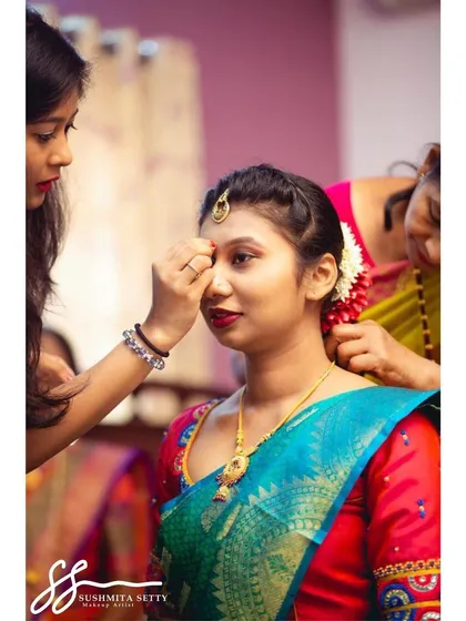 The bindi is such a powerful accessory. Here I am placing it to complete her traditional engagement look, adding that final touch of elegance.
