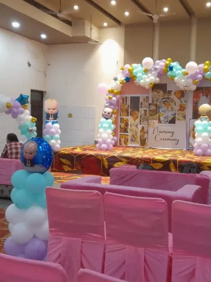 Another view of the Boss Baby themed naming ceremony stage and hall.