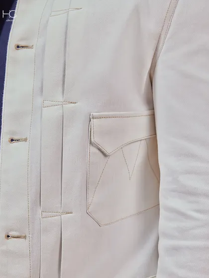 White done right. This close-up shows the structured pocket and pleat details of my premium white shacket, a piece that is sleek, structured, and undeniably premium.