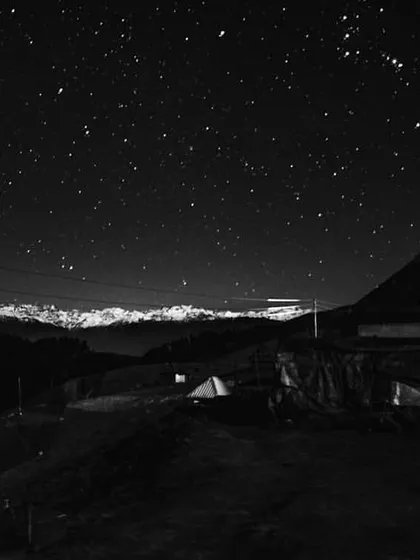 a starry night over a mountain hut. this image captures a sense of wonder and exploration, a feeling i aim to evoke in discovery-focused apps.