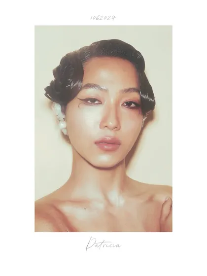 Another polaroid-style portrait of Patricia. The slightly smudged makeup and direct gaze give the image a raw, behind-the-scenes feel, as if capturing a moment of vulnerability.