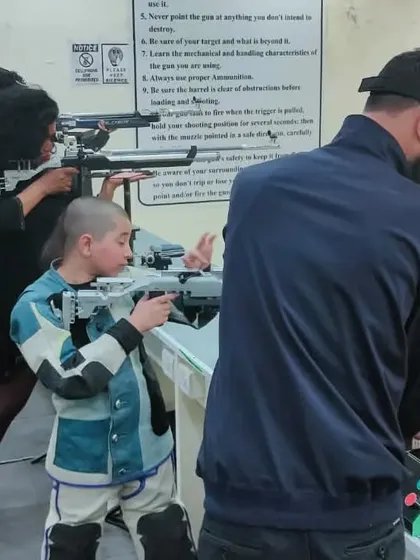 Event management is also about fostering the next generation. Here, I am overseeing a friendly match, providing a platform for young shooters to gain valuable competition experience in a supportive environment.