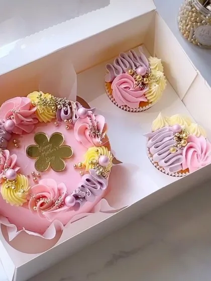 My Mother's Day bento box is one of my most popular gifts. This set features a lovely mini cake and two coordinating cupcakes, all beautifully packaged and ready to make her day extra sweet.