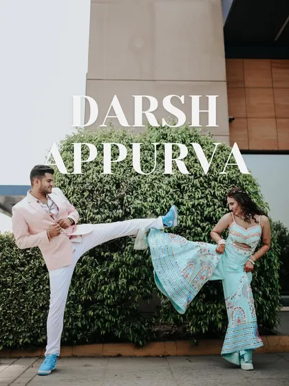 A hilarious and action-packed shot from a pool party event. This playful kick-fight pose shows the couple's fun-loving personalities and the unique energy of a themed celebration.