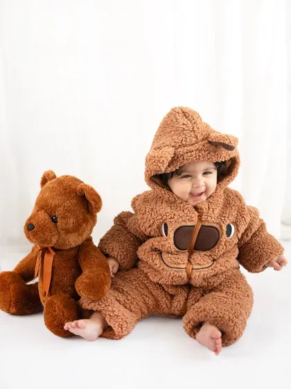 Can it get any cuter? This little one is dressed as a teddy bear for his seven-month milestone shoot. I adore creating these playful, themed sessions that capture the pure joy of being a baby.
