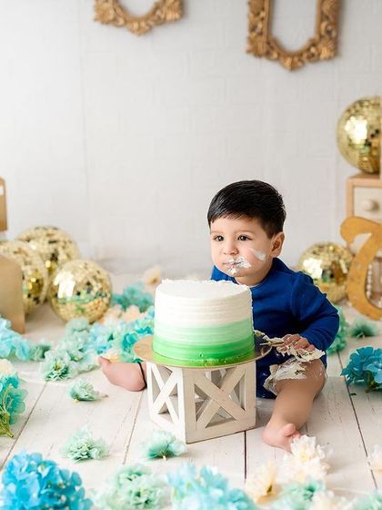 A look of pure mischief and delight after diving into the cake. My cake smash sessions are all about letting your baby explore and have fun in a safe, beautiful setting.
