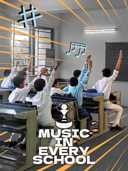 "Music in Every School" is our vision. This image of students with their hands raised, ready to participate, embodies the energy and potential we want to unlock in every child.