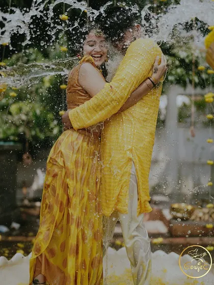 The pure, unadulterated joy of a Haldi ceremony. I focus on creating a fun, vibrant atmosphere where you and your loved ones can make memories like this.