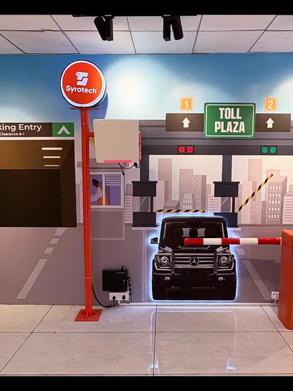 A creative and interactive display in our Experience Zone, illustrating how our solutions are applied in real-world scenarios like parking entries and toll plazas.