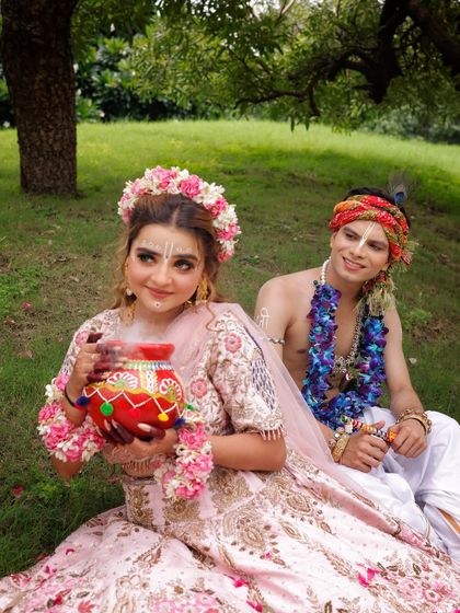 A serene portrait of Radha and Krishna. The makeup details, like the tilak, are carefully applied to create an authentic look.