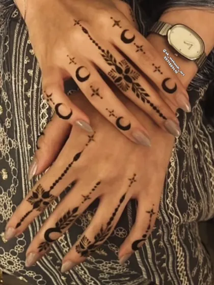 For those who love a modern and minimalist look, I offer chic Arabic and fusion designs. This Eid-inspired pattern uses negative space with crescent moons and stars for a contemporary feel.