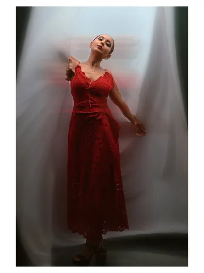 Movement is a story in itself. Here, I used a slow shutter speed to capture the grace of the dancer, blurring the background to create a sense of ethereal motion and focusing on the vibrant red of her dress.