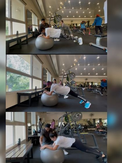 Guiding my clients through core stability work on a fitness ball. I focus on controlled, steady movements and provide hands-on adjustments to ensure they are performing the plank safely and effectively.