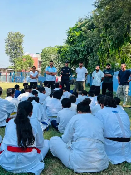 A Gurukul is a place of learning and discipline. Here, I am addressing my students outdoors, teaching them lessons that go beyond the mat. We are a team dedicated to martial arts.