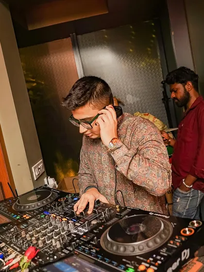 Adjusting the levels, making sure the sound is perfect for the room. Every detail matters.