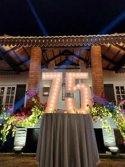 Milestone birthdays deserve to be in the spotlight. We designed these custom marquee light-up numbers for a 75th birthday party, creating a perfect photo opportunity and a focal point for the celebration.