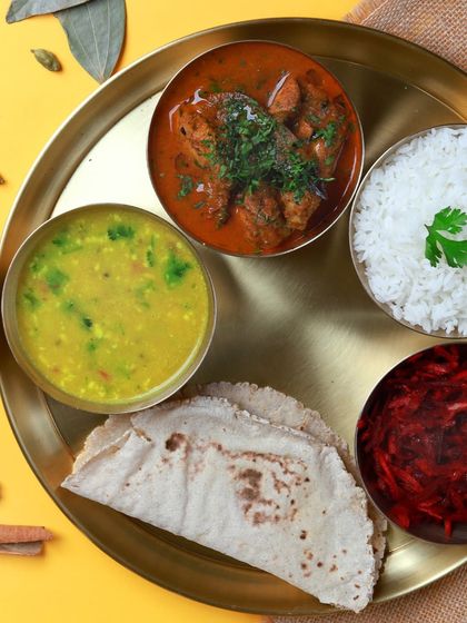 No filters, just real food. This thali with chicken curry, dal, rice, bhakri, and beetroot salad is a testament to my promise of honest, home-style cooking.