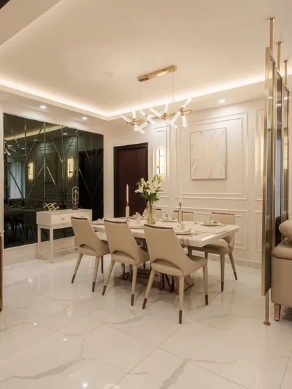 This dining space is a sanctuary of style, designed for both everyday comfort and elevated entertaining. We used a neutral palette, rich materials, and layered ambient lighting to create a space where cherished memories can be made over shared meals.